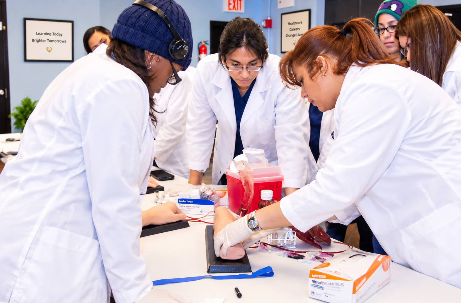 Clinical learners participating in hands-on skills training